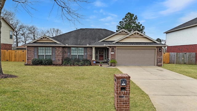 view of front facade with a garage and a front lawn