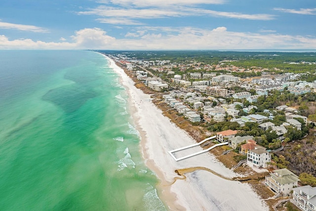 aerial view featuring a view of the beach and a water view