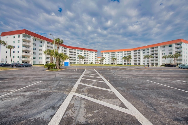 909 Santa Rosa Blvd Unit 611, Fort Walton Beach, FL 32548 - uncovered parking lot with a city view