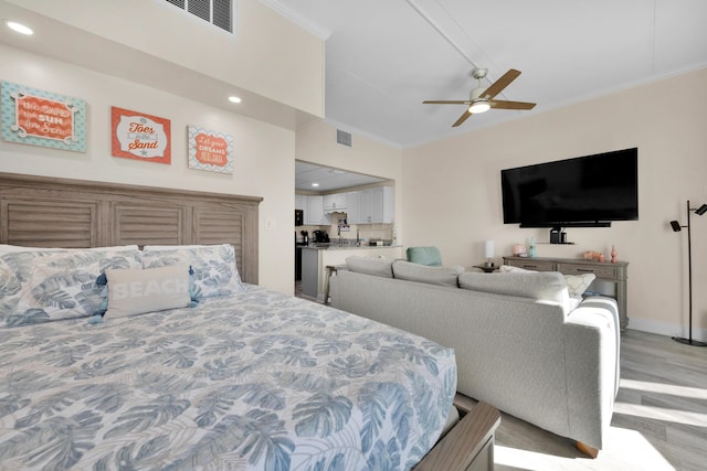 909 Santa Rosa Blvd Unit 611, Fort Walton Beach, FL 32548 - bedroom featuring recessed lighting, visible vents, crown molding, and light wood-style flooring