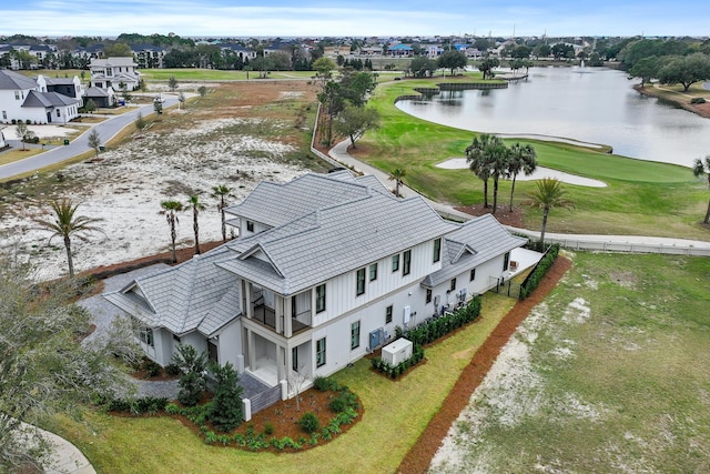 aerial view featuring a water view and a residential view