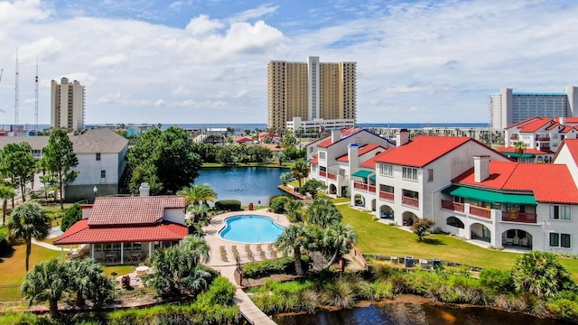 birds eye view of property featuring a water view