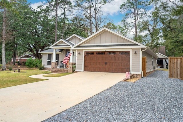 craftsman house featuring a garage and a porch