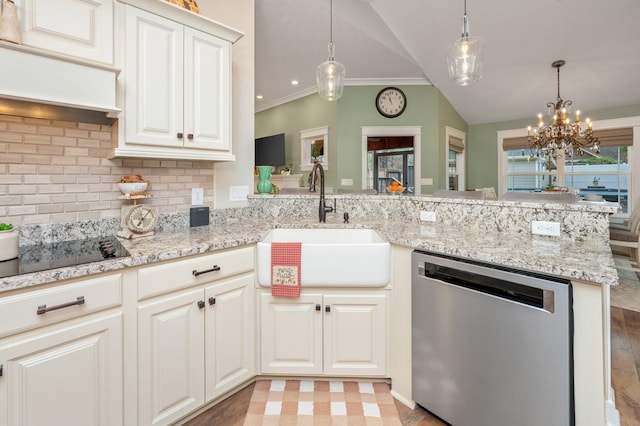 kitchen with sink, dishwasher, hanging light fixtures, vaulted ceiling, and kitchen peninsula