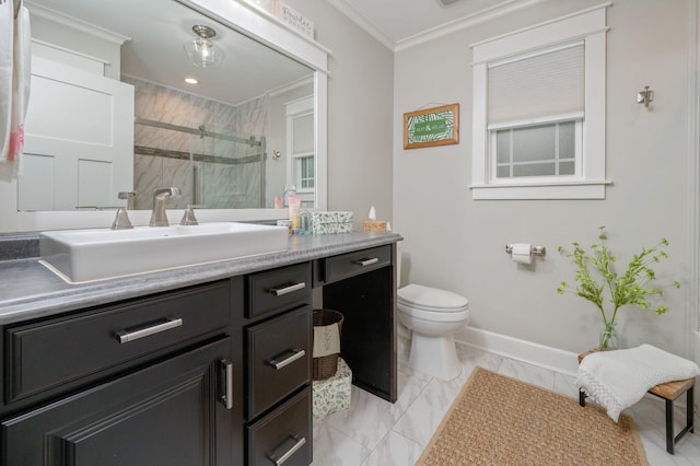 bathroom featuring a shower with door, ornamental molding, vanity, and toilet