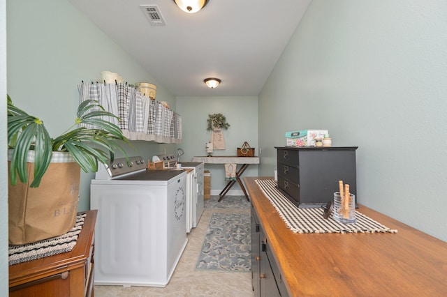 interior space with washer and clothes dryer