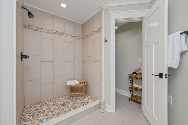 bathroom featuring a tile shower