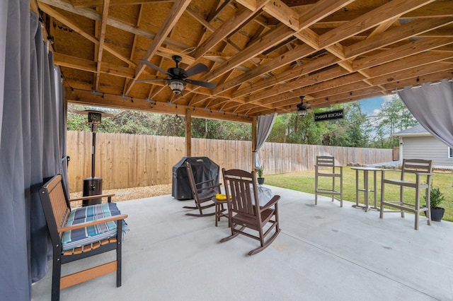 view of patio with ceiling fan and grilling area