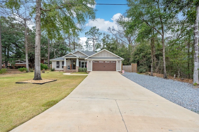 view of front facade featuring a garage and a front lawn