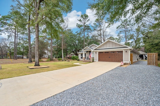 craftsman-style house with a garage and a front yard