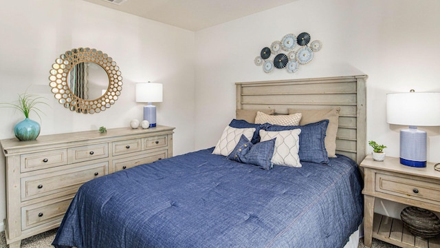 bedroom with visible vents