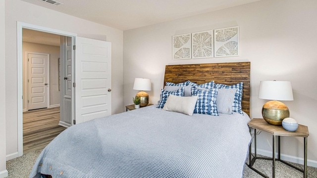 bedroom featuring baseboards