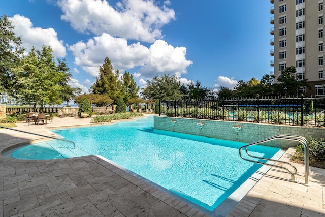 view of pool with a patio area