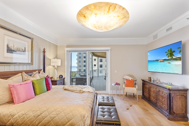 bedroom with light wood-type flooring, access to outside, and ornamental molding