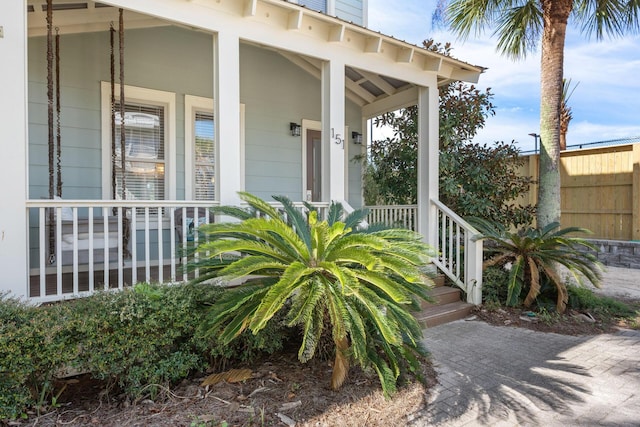 doorway to property featuring covered porch