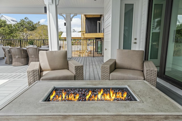 balcony featuring a fire pit