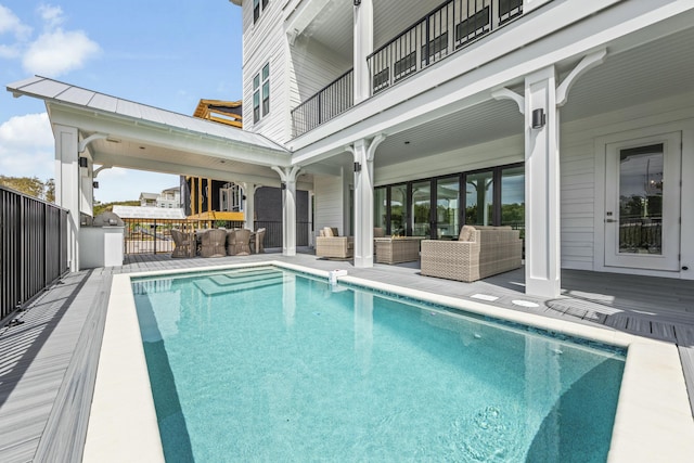 view of swimming pool with an outdoor living space