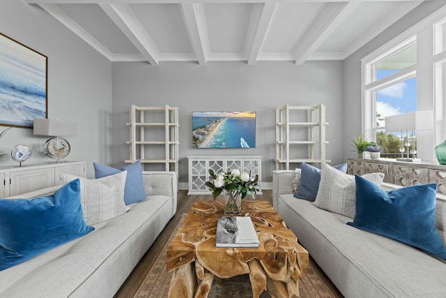 living room with beamed ceiling, ornamental molding, and dark hardwood / wood-style flooring