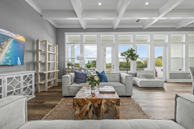 living room featuring coffered ceiling, ornamental molding, beam ceiling, and hardwood / wood-style floors