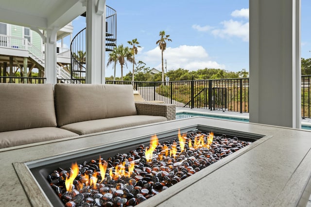 view of patio with an outdoor fire pit