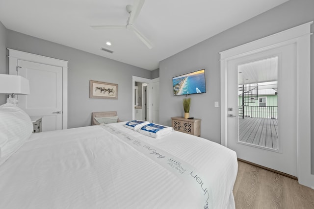 bedroom with ceiling fan and light wood-type flooring