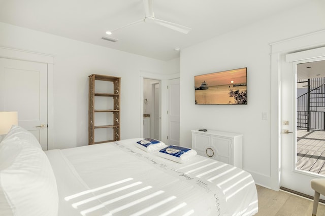 bedroom featuring ceiling fan and light wood-type flooring