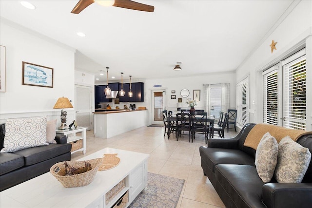 54 Rue Du Soleil, Santa Rosa Beach, FL 32459 - living room featuring light tile patterned floors, healthy amount of natural light, ceiling fan, recessed lighting, and ornamental molding