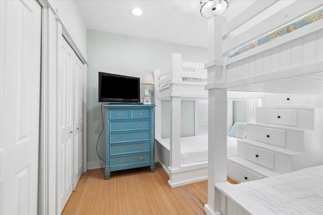 54 Rue Du Soleil, Santa Rosa Beach, FL 32459 - bedroom with light wood-type flooring, a closet, and recessed lighting