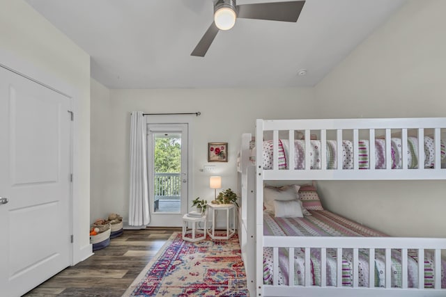 bedroom featuring access to outside, ceiling fan, and wood finished floors