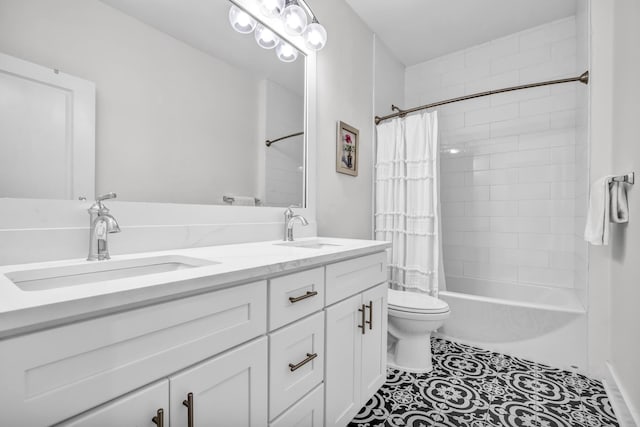 bathroom with double vanity, shower / tub combo, a sink, and toilet