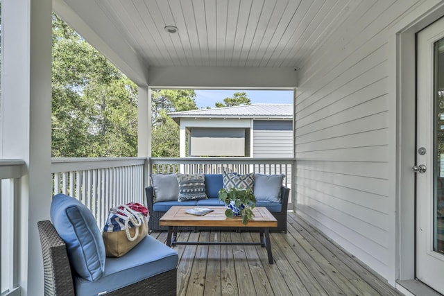 deck with an outdoor hangout area