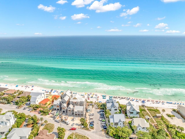 bird's eye view featuring a beach view and a water view