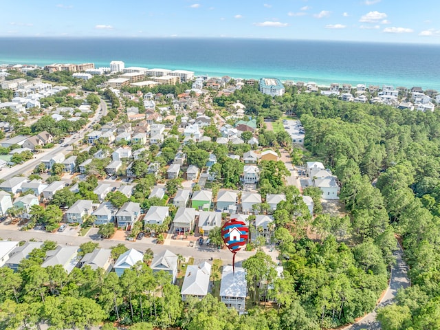 birds eye view of property featuring a water view and a residential view