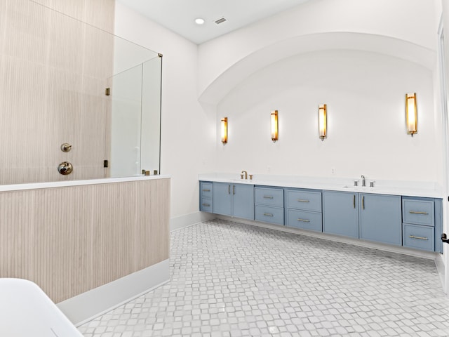 147 Quail Hollow Ct, Watersound, FL 32461 - full bath featuring tiled shower, baseboards, double vanity, tile patterned floors, and a freestanding bath