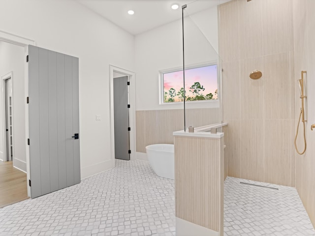 147 Quail Hollow Ct, Watersound, FL 32461 - bathroom featuring a freestanding bath and walk in shower