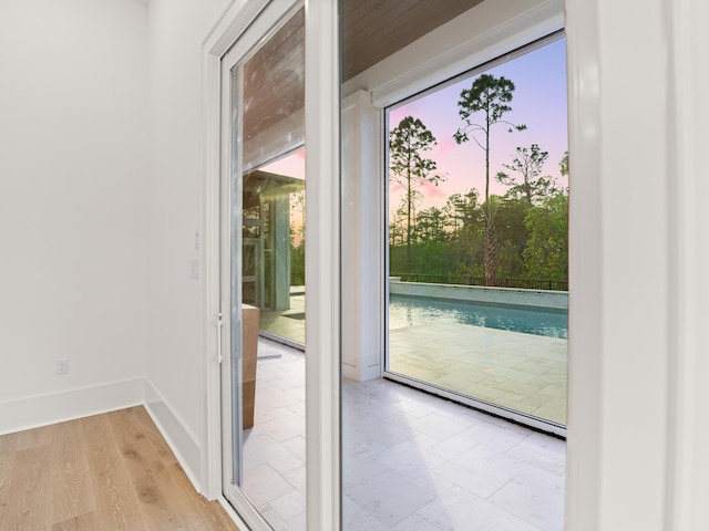 147 Quail Hollow Ct, Watersound, FL 32461 - doorway featuring baseboards