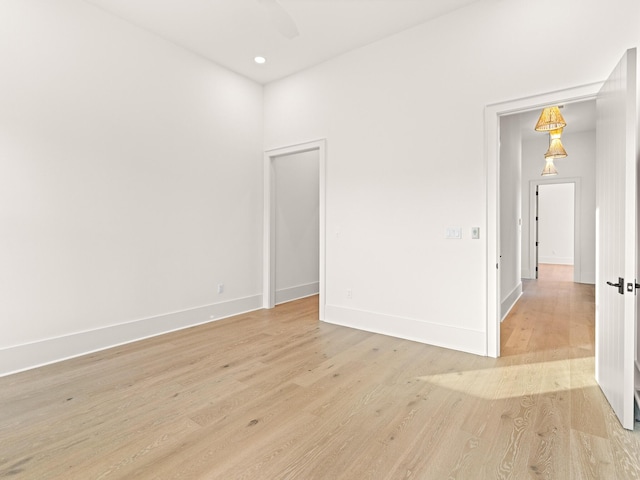 147 Quail Hollow Ct, Watersound, FL 32461 - spare room with light wood-type flooring, baseboards, a ceiling fan, and recessed lighting