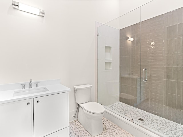 147 Quail Hollow Ct, Watersound, FL 32461 - full bath with a stall shower, toilet, vanity, and baseboards