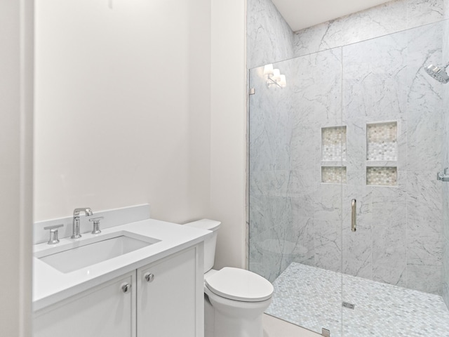 147 Quail Hollow Ct, Watersound, FL 32461 - full bathroom with a marble finish shower, toilet, and vanity