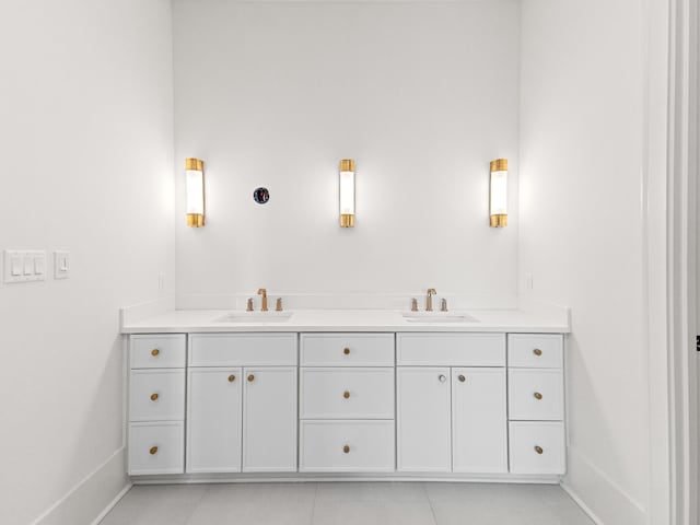 147 Quail Hollow Ct, Watersound, FL 32461 - bathroom with baseboards, tile patterned floors, and double vanity