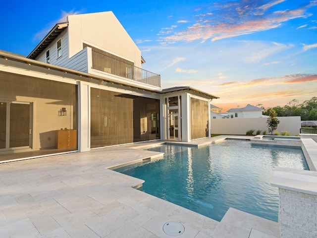147 Quail Hollow Ct, Watersound, FL 32461 - view of pool featuring a patio area, fence, and a pool with connected hot tub