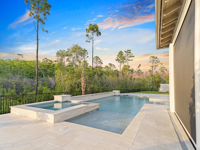 147 Quail Hollow Ct, Watersound, FL 32461 - view of pool featuring a patio and a pool with connected hot tub