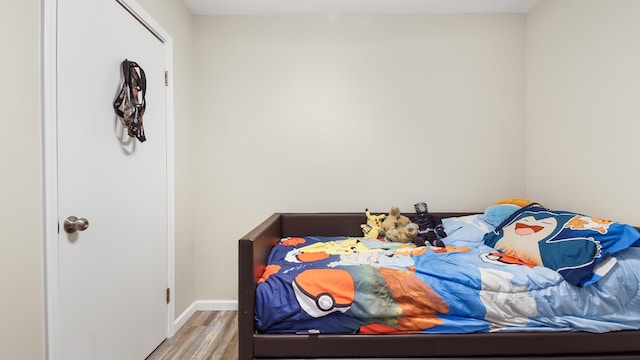 bedroom featuring light hardwood / wood-style floors