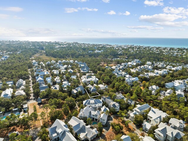 aerial view with a water view and a residential view