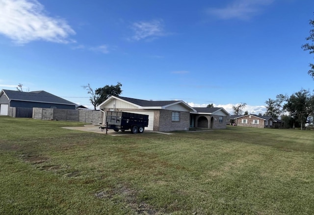 view of yard with a garage