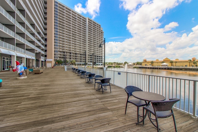 9860 S Thomas Dr Unit 921, Panama City Beach, FL 32408 - wooden deck featuring a water view