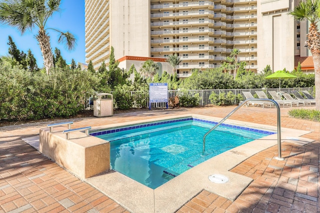 9860 S Thomas Dr Unit 921, Panama City Beach, FL 32408 - view of swimming pool featuring a pool, a patio area, and fence
