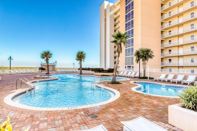 9860 S Thomas Dr Unit 921, Panama City Beach, FL 32408 - pool with a patio area