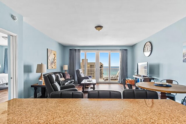 9860 S Thomas Dr Unit 921, Panama City Beach, FL 32408 - living room featuring wood finished floors and french doors