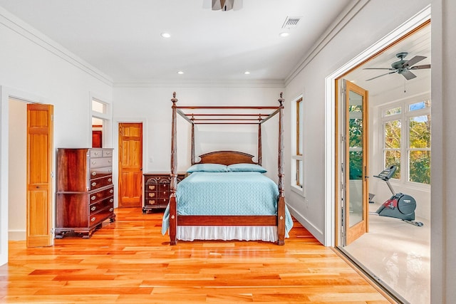 bedroom with light wood-style floors, recessed lighting, visible vents, and ornamental molding